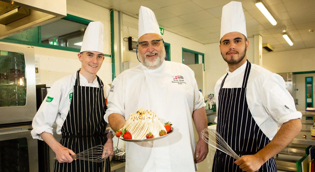 Level 2 Professional Cookery students Pearse Sweeney (Bangor) and John Bennett (Bangor) with SERC Lecturer Brian Magill.